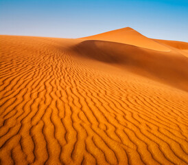 Wall Mural - Amazing view of sand dunes in the Sahara Desert. Location: Sahara Desert, Merzouga, Morocco. Artistic picture. Beauty world.