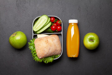 Wall Mural - Lunch box with sandwich, vegetables and juice