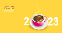 Happy New Year 2023 Concept. Minimalistic Style Coffee Time With A Cup Of Coffee On Yellow Background.
