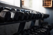 © Sharne T/peopleimages.com - Zoom, fitness or workout dumbbells in gym studio for bodybuilding development, exercise or muscle training health wellness. Metal, motivation or heavy weights for sports, power or healthy lifestyle