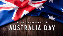 Happy Australia Day Concept. Australian Flag Against Old Wooden Background. 26 January.