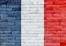France Flag On A Brick Wall