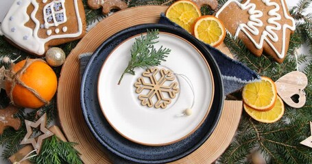 Poster - Christmas table setting. Holiday concept, rotate, top view. Christmas and New Year holidays mood