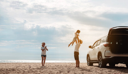 Wall Mural - Happy Family with car travel road trip. summer vacation in car in the sunset, Dad, mom and daughter happy traveling enjoy together driving in holidays, people lifestyle ride by automobile.