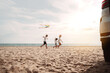 © Kiattisak - Happy Family with car travel road trip. summer vacation in car in the sunset, Dad, mom and daughter happy traveling enjoy together driving in holidays, people lifestyle ride by automobile.