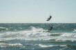 Kite surfers water sport event at neach in Zeeland