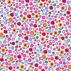 Amazing seamless floral pattern with bright colorful flowers and leaves on a white background. The elegant the template for fashion prints. Modern floral background. Folk style.