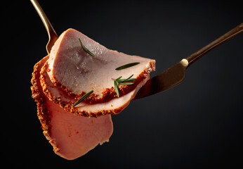 Wall Mural - Spicy sliced ham with rosemary.