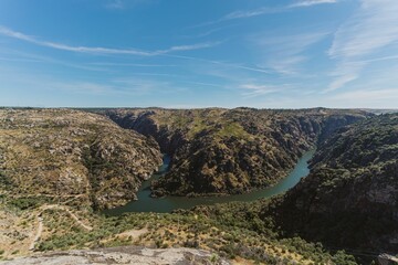 Wall Mural - aerial shot of douro international natural park, the river, valley among the mountains, in portugal