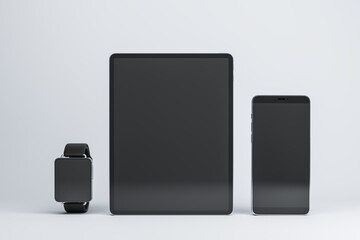 Front view on blank black modern devices screens with place for your logo or text, smart watches, digital tablet and smartphone on light background. 3D rendering, mock up