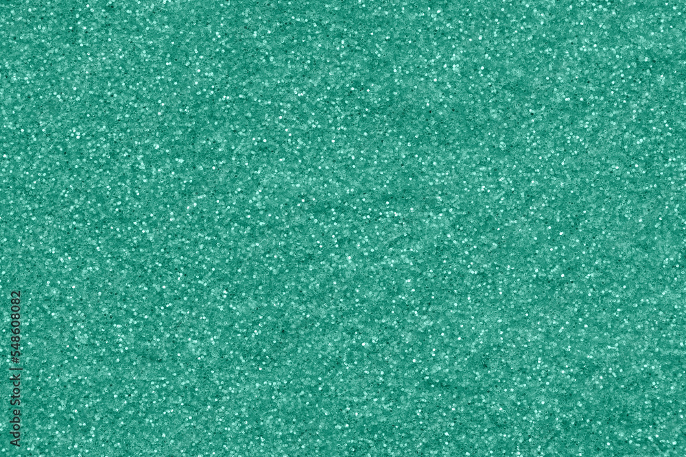 Small mint sequins as background, closeup