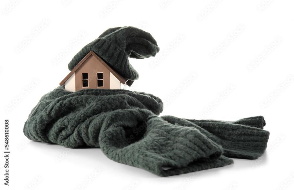 House model with hat and scarf on white background. Heating concept