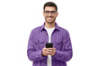 © Damir Khabirov - Young modern man in casual purple shirt and glasses, holding smart phone in hands, looking at camera with smile
