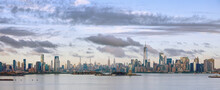 USA, New York, New York City, Panoramic View Of City Skyline At Sunset