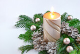Fototapeta  - Bożonarodzeniowe tło ze świecą, gałązkami jodły, szyszkami, bombkami i ozdobami