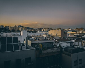 Canvas Print - Beautiful view of apartment buildings under the clear sky during sunset