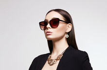 Fashion Portrait Of Beautiful Sexy Woman In Sunglasses And Jewelry
