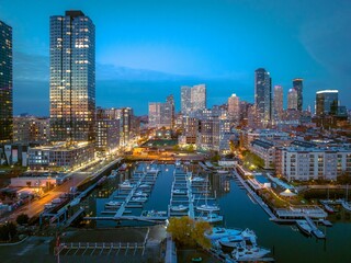 Canvas Print - Drone shot of skyscrapers in New Jersey in the late evening