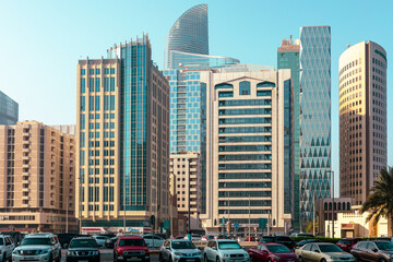 Wall Mural - Abu Dhabi Streets and Skyscrapers. Tall Modern Glass Buildings in Abu Dhabi. United Arab Emirates.