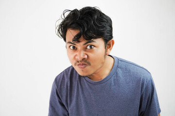 Handsome asian young man angry man and annoyance with navy color casual outfit isolated on white background