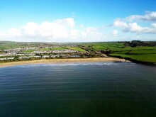 Distant Shot Of Par Beach With A Coastal Town View In Front Of The Ocean, Cornwall