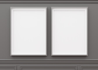 Two blank vertical picture frames hanging on gray wall. Template, mock up for artwork, picture or poster. Empty, copy space. Close up view. Simple, minimalist mockup. 3D rendering.