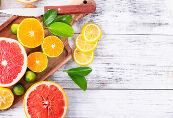 Wall Mural - citrus fruit on wooden table