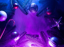 Christmas Layout With Christmas Tree Branches, Christmas Decorations In Vibrant Neon Glow. Copy Space. Top View. Flat Lay