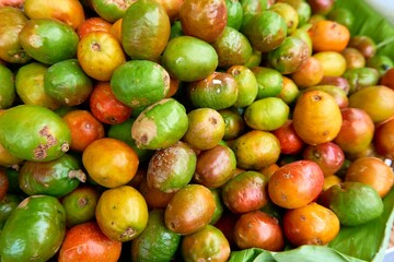 Wall Mural - Closeup of Jocote fruits (Spondias purpurea) in a market