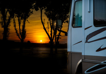 Wall Mural - Camping waking up to a beautiful sunrise in a camper motorhome