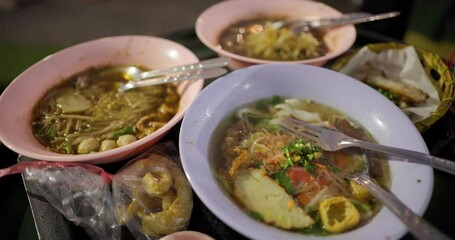 Canvas Print - Thai noodle with pork and meatball in blood soup