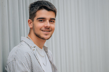 Sticker - portrait of young man on the street with copy-space