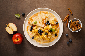 Canvas Print - Crepes with caramelized cinnamon apples, top view