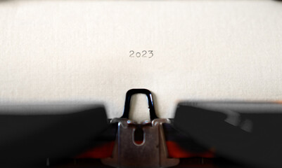 Wall Mural - Old Typewriter with following text on paper - 2023 Chapter one. new years concept