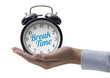 PNG file no background Hand holding a vintage alarm clock with break time message