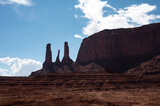 Fototapeta  - Nice desert landscape with rocky Monument Valley. It's a sunny summer day with blue sky