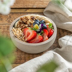 Canvas Print - Bowl of delicious dessert with sweet strawberries, bananas and blueberries