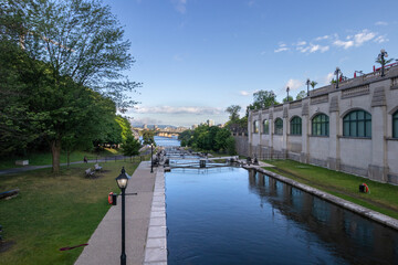 Wall Mural - Ottawa, Ontario, Canada - August 4, 2022: Lock 1 thru 8 on the historic Rideau Canal in downtown Ottawa.