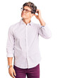 © Krakenimages.com - Young handsome man wearing business clothes and glasses confuse and wondering about question. uncertain with doubt, thinking with hand on head. pensive concept.