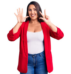 Poster - Young beautiful brunette woman wearing elegant clothes showing and pointing up with fingers number eight while smiling confident and happy.