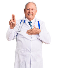 Wall Mural - Senior handsome grey-haired man wearing doctor coat and stethoscope smiling swearing with hand on chest and fingers up, making a loyalty promise oath