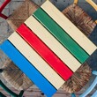 Top view of a wooden colorful table and four chairs