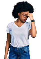 Poster - Young african american woman wearing casual white t shirt tired rubbing nose and eyes feeling fatigue and headache. stress and frustration concept.