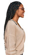 © Krakenimages.com - African american woman wearing casual clothes looking to side, relax profile pose with natural face and confident smile.