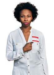 Poster - African american woman with afro hair wearing hello my name is sticker identification skeptic and nervous, frowning upset because of problem. negative person.