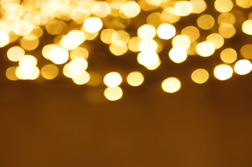 Wall Mural - gold christmas holiday new year lights bokeh overlay background