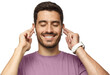 © Damir Khabirov - Young man in purple t-shirt listening his favourite song or music, feeling the rhythm and vibe with eyes closed