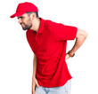 © Krakenimages.com - Young handsome man with beard wearing delivery uniform suffering of backache, touching back with hand, muscular pain