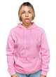© Krakenimages.com - Young caucasian woman wearing casual sweatshirt sticking tongue out happy with funny expression. emotion concept.