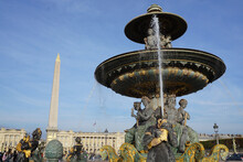 Fountain In The Square Of La Concorde With The Obelisk In Paris France